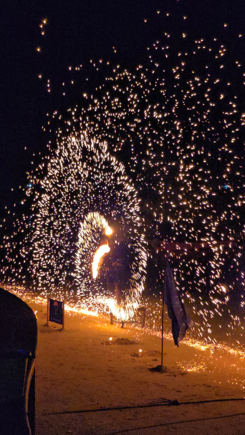 A fire performance after dark in Thailand.